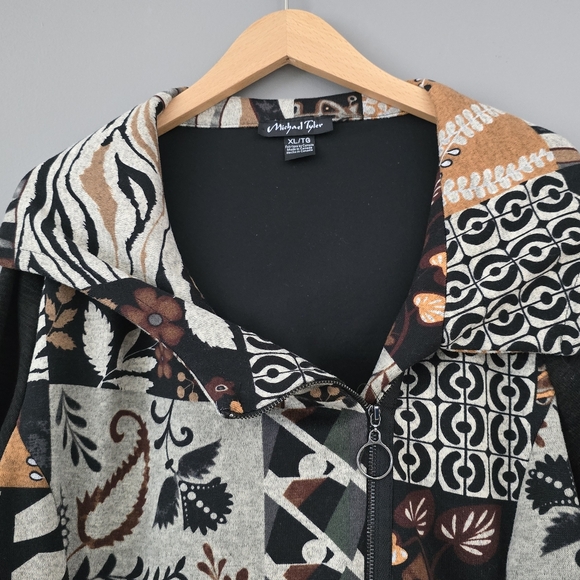Long-sleeve, hooded asymmetrical zip-up jacket.  Patchwork design. - Picture 5 of 8